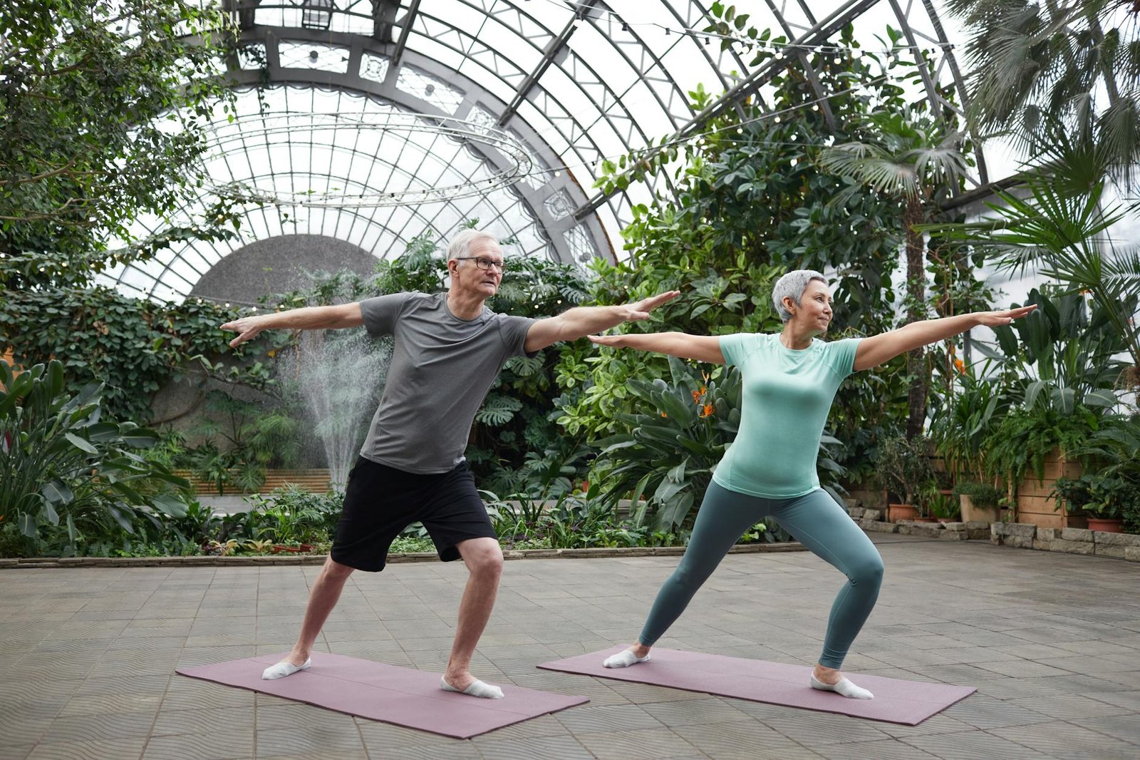 couple practicing yoga